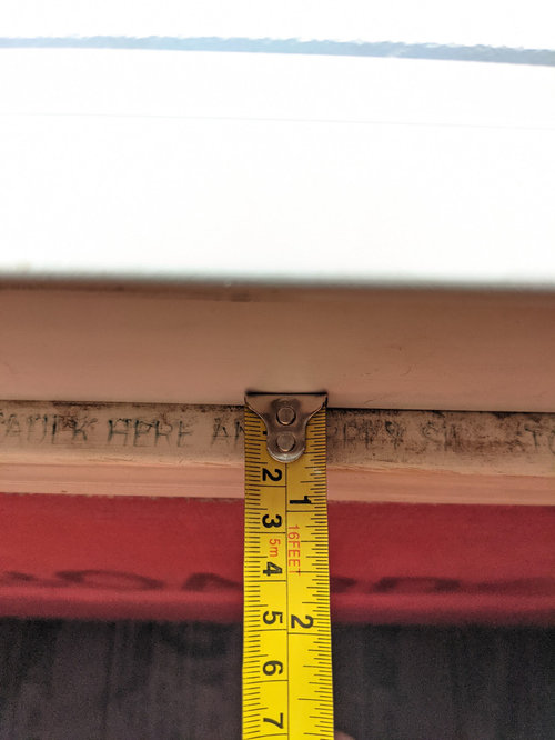 Shallow Wooden Window Frame in Shower