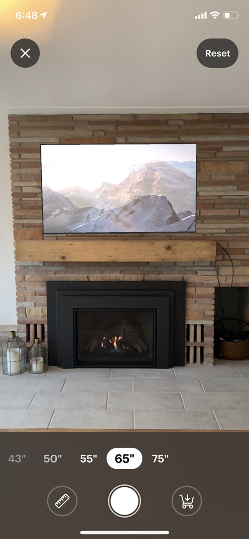 Tv size above fireplace
