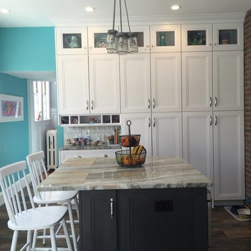 Omega Loring Full Access Transom Cabinetry with Fantasy Brown Quartzite Counters