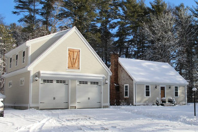 Garage - large detached two-car garage idea in Boston