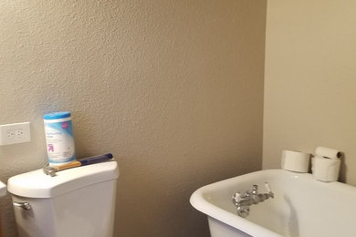 Inspiration for a small timeless master beige tile and ceramic tile ceramic tile and gray floor bathroom remodel in San Diego with white cabinets, a two-piece toilet, quartz countertops and white countertops