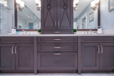 Design ideas for a large transitional master bathroom in Houston with recessed-panel cabinets, grey cabinets, a double shower, white tile, blue walls, an undermount sink, engineered quartz benchtops, white floor and a hinged shower door.