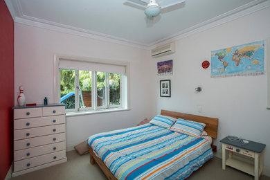 This is an example of a contemporary bedroom in Perth.