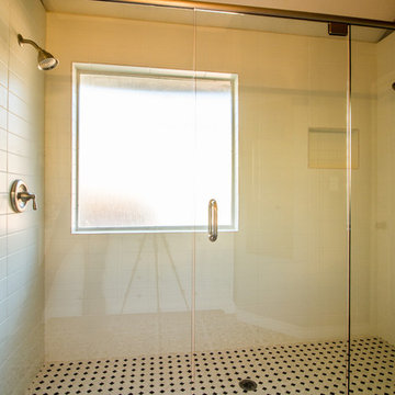 Basic 90's to fashion forward master bath