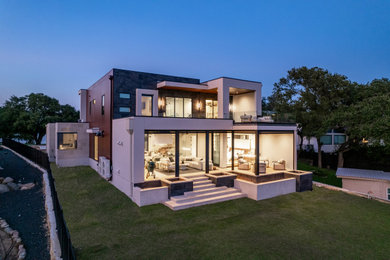Example of a minimalist two-story exterior home design in Austin