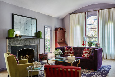 Living room - transitional formal living room idea in Los Angeles with purple walls and a standard fireplace