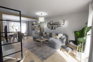 Immagine di un soggiorno scandinavo di medie dimensioni e aperto con pavimento in laminato, TV a parete, pareti in mattoni e camino ad angolo