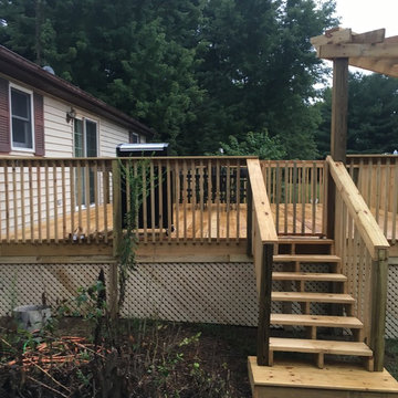Small deck and decorative pergola; customer request for lattice.