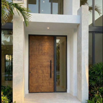 Custom Mahogany Hurricane-Rated Pivot Door | Miami, FL