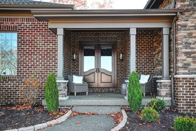 Example of a transitional exterior home design in Other