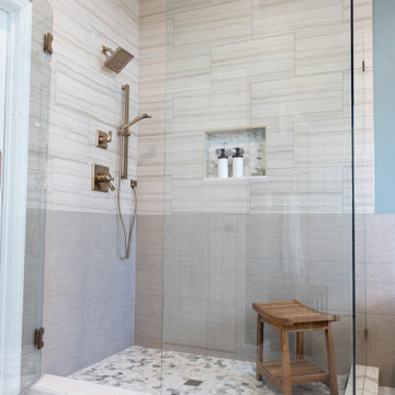 Spa Like Primary Bathroom Remodel with Warm Wood & Brass Details