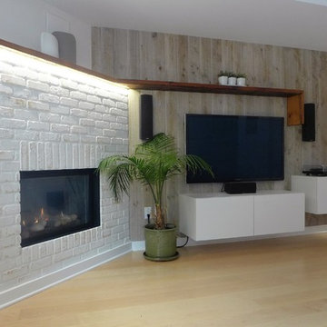 Fireplace surround constructed and tiled with sliced clay bricks from Merkley Su