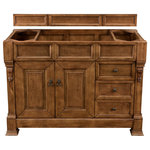 James Martin Vanities - Brookfield 48" Country Oak Single Vanity - The Brookfield 48" Country Oak vanity by James Martin Vanities features hand carved accenting filigrees and raised panel doors. Two doors open to shelves for storage below and two drawers, made up of a lower double-height drawer and a middle standard drawer, offer additional storage space. The look is completed with Antique Brass finish door and drawer pulls. Matching decorative wood backsplash is included.