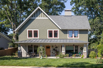 Inspiration for a mid-sized craftsman green two-story mixed siding exterior home remodel in DC Metro with a mixed material roof and a gray roof