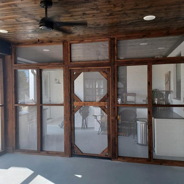 Custom Dark Stained Screened Porch with Tongue & Groove Ceiling