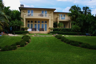 Inspiration for a tropical home design remodel in Miami