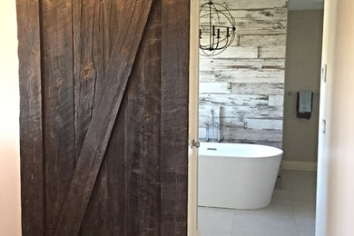 Mid-sized mountain style master gray tile and porcelain tile porcelain tile bathroom photo in Calgary with shaker cabinets, medium tone wood cabinets, a one-piece toilet, beige walls, a drop-in sink and quartzite countertops