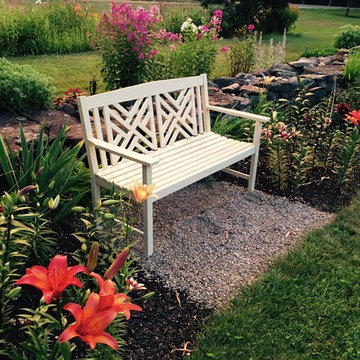 Rock Rich- a quiet spot along the border bed, Fretwork Bench