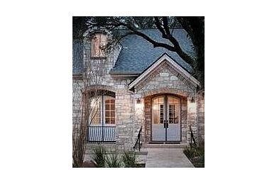 Mid-sized french country entryway photo in Austin