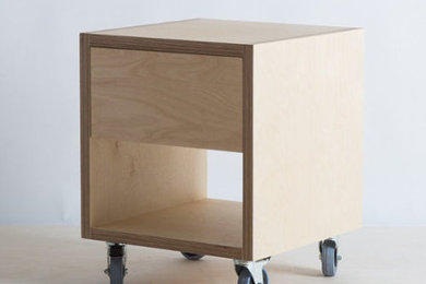 Bedside table with drawer on wheels