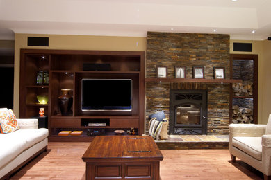 Example of a minimalist family room design in Montreal