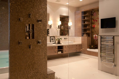 This is an example of a large contemporary bathroom in Los Angeles with a vessel sink, flat-panel cabinets, an undermount tub and a shower/bathtub combo.