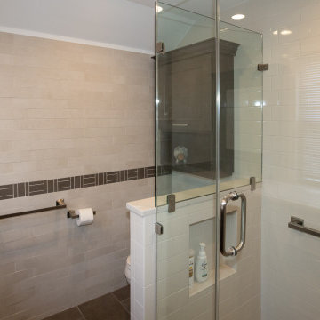 Sleek Contemporary Master Bathroom | Dark Vanity & Frameless Shower