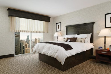 Transitional master carpeted bedroom photo in Las Vegas with beige walls