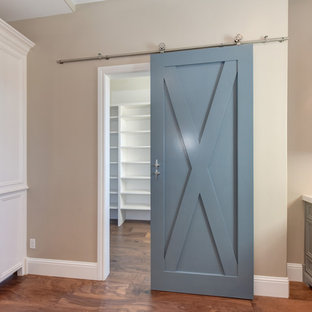 Large traditional kitchen pantry remodeling - Example of a large classic l-shaped dark wood floor and brown floor kitchen pantry design in Sacramento with an undermount sink, raised-panel cabinets, white cabinets, quartz countertops, white backsplash, subway tile backsplash, an island and white countertops