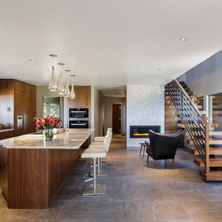 Midcentury modern open concept kitchen ideas - Example of a 1950s open concept kitchen design in Portland with an undermount sink, flat-panel cabinets, medium tone wood cabinets and an island