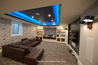 Mid-sized trendy look-out laminate floor, gray floor, tray ceiling and wallpaper basement photo in New York with beige walls