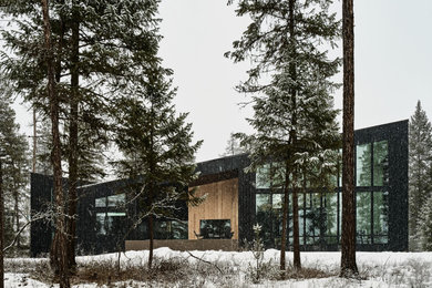 Modern exterior home idea in Other