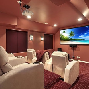 Design ideas for a medium sized classic enclosed home cinema in Other with orange walls, carpet, red floors and a projector screen.