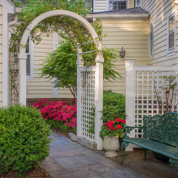 Graceful arbor entry screens unsightly areas