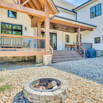 Serene Hilltop Backyard Oasis: Covered Deck, Fire Pit, and Panoramic Views in Co