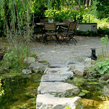 Landhausgarten mit Boulebahn und Pool