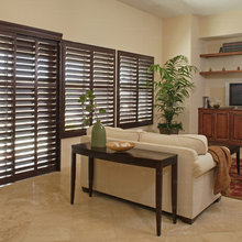 Dark shutters  cream tile floor