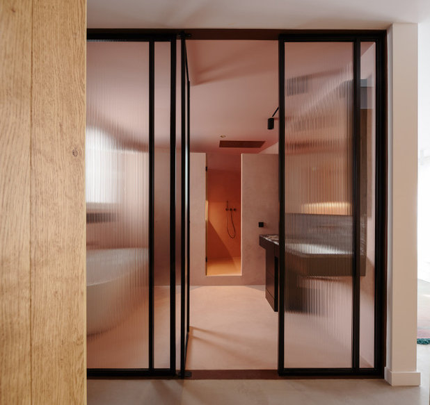 Moderno Cuarto de baño by Raúl Sánchez Architects