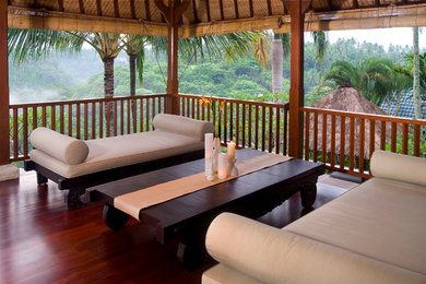 Inspiration for a huge tropical home design remodel in Other