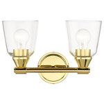 Livex Lighting - Catania 2-Light Polished Brass Vanity Sconce - The clean and simple Catania vanity sconce features a polished brass finish with hand blown clear glass. This sleek design will brighten up any bathroom.
