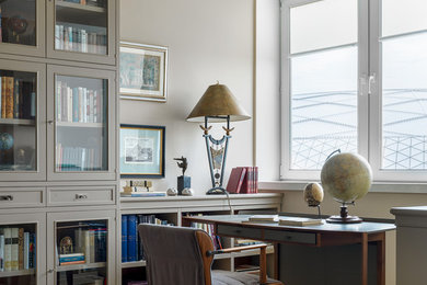 Design ideas for a contemporary home office in Moscow with a library.
