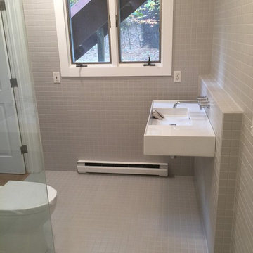 Custom tiled master bath with barrier free shower