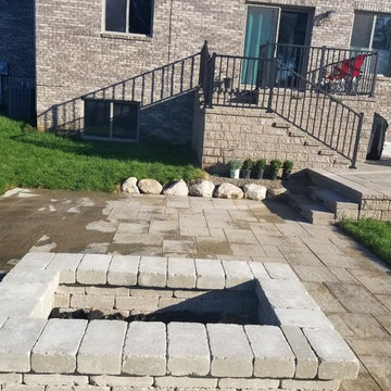Three Tiered Unilock Patio on a waterfront.