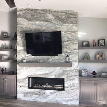 Fantasy Brown leathered granite fireplace surround
