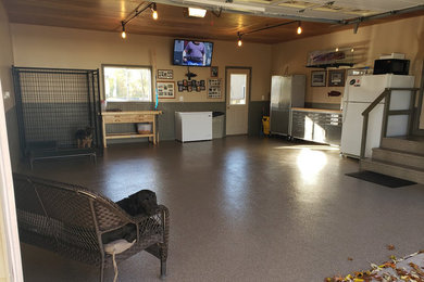 Inspiration for a mid-sized attached two-car garage remodel in Detroit