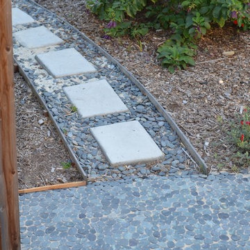 Natural stone sliced pebble tile path