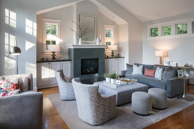 This is an example of a contemporary formal enclosed living room in Seattle with grey walls, medium hardwood floors, a standard fireplace, a tile fireplace surround and no tv.