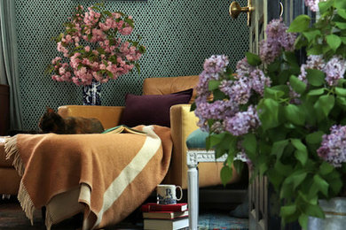 Study room - small eclectic medium tone wood floor and brown floor study room idea in New York with green walls