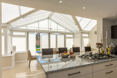 Photo of a large contemporary sunroom in Wiltshire.