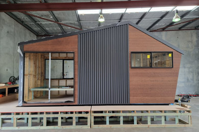 Photo of a small modern home design in Perth.